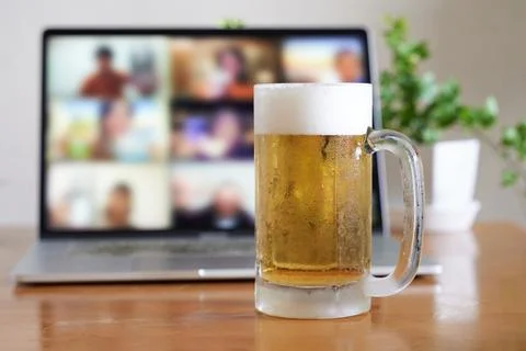 Image of an online drinking session using a computer Stock Photos
