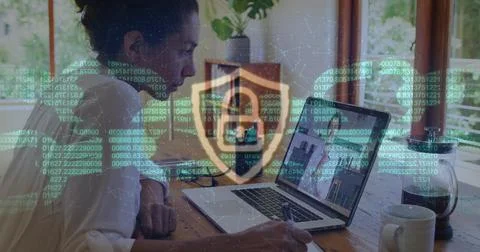 Image of online security padlock and chain over businesswoman on laptop image Stockfoto's