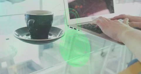 Image of online security padlock over woman using laptop Foto stock