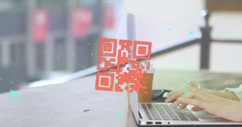 Image of online security qr code over woman using laptop Stock Photos