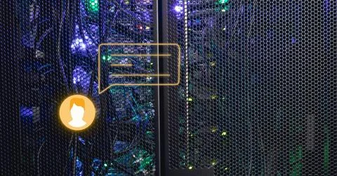 Image of orange chat bot message icon over glowing computer servers Stock Photos