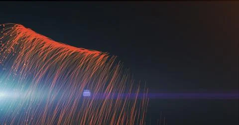 Image of orange light trails falling and blue light spot against black Stock Illustration