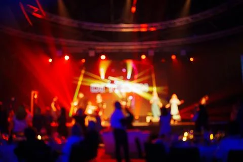 The image is out of focus. dancing on stage and in the banquet hall. Stock Photos