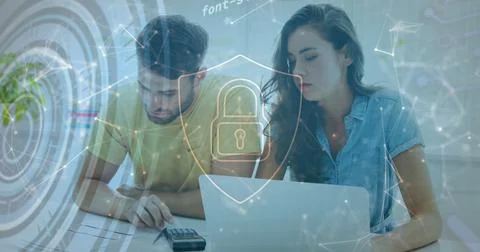 Image of padlock, connected dots, computer language, caucasian couple analyzing Stock Photos