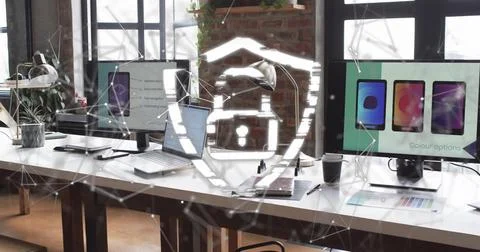 Image of padlock, connections and data processing over computers on desks in Stock Photos