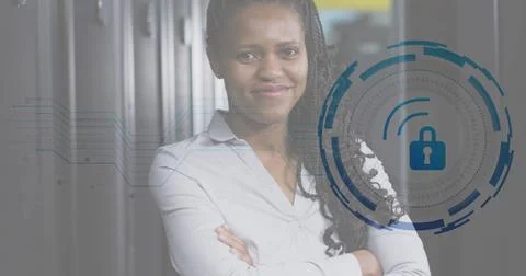 Image of padlock icon and african american female engineer standing in data Stock Photos