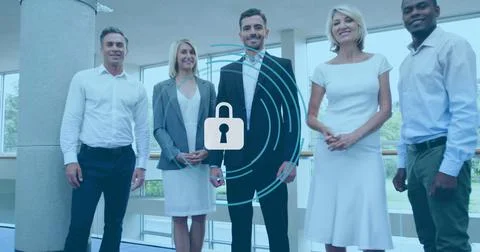 Image of padlock icon over diverse people in office Stockfoto's