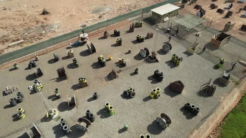 Image of a paintball field with obstacles and bunkers viewed from the air Vídeos de archivo 247186360