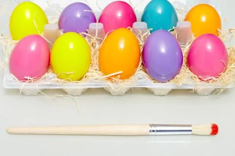 Image of painted easter eggs with paintbrush near by Stock Photos