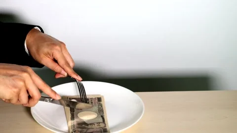 The image of a person who eats money Stock Footage 334811329