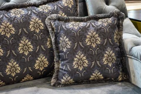 The image of the pillow lying on the bed. Stock Photos