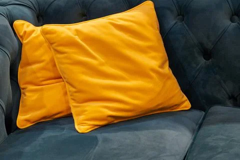 The image of the pillow lying on the bed. Stock Photos