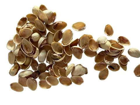 Image of pistachio shells on white background Stock Photos