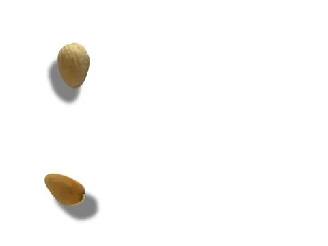 Image of pistachio shells on white background 写真素材
