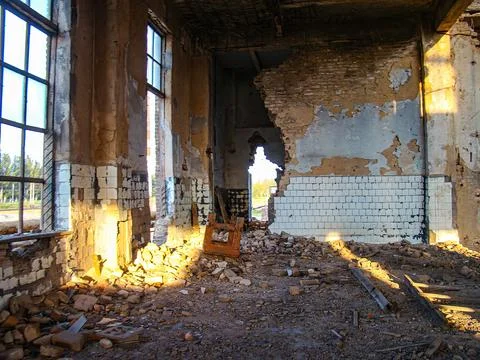 The image portrays an abandoned, dilapidated interior space with peeling wa.. Stock Photos
