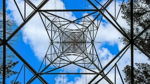 Image of power pole photographed vertically from ground perspective Stock Photos