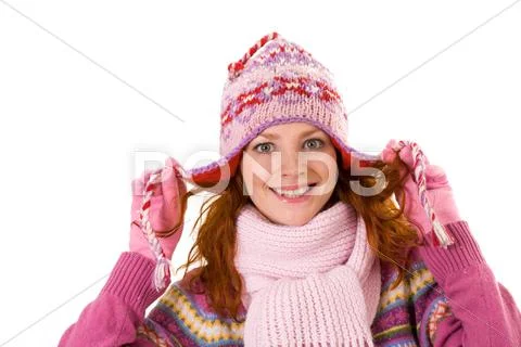 Image of pretty woman in pink winter cap posing before camera Stock Photos