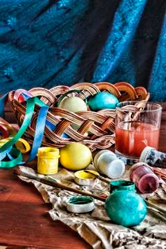Image of the process of coloring Easter eggs at home. Easter. Eggs in a baske Stock Photos