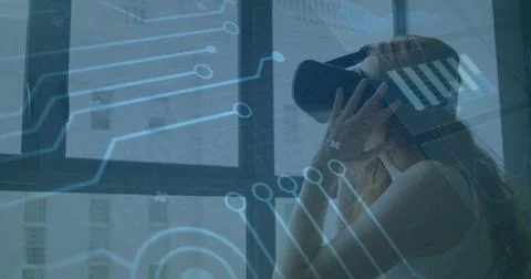 Image of processor elements and screens with data processing over woman wearing Stockfoto's