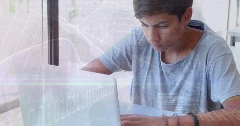 Image of programming data and graphs moving over caucasian boy studying over Stockfoto's