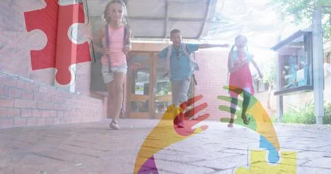 Image of puzzles falling over ribbon formed with puzzles and school children Stock Photos