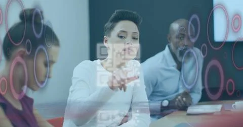 Image of qr code and data processing over diverse business people in office 写真素材