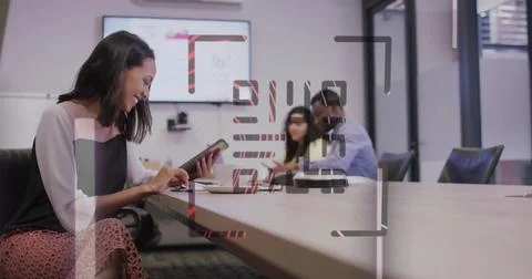 Image of qr code and neon lines over diverse business people discussing work 写真素材