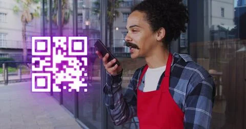 Image of qr code over biracial businessman talking on smartphone Stock Photos