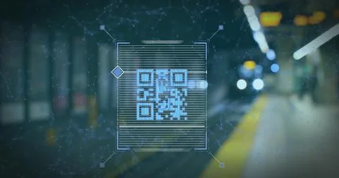 Image of qr code scanner against blurred view of train arriving at a station Stock-Fotos