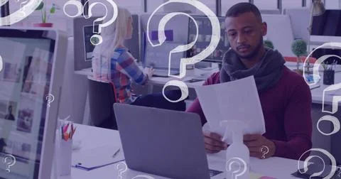 Image of question marks icons over diverse business people holding document Stockfoto's