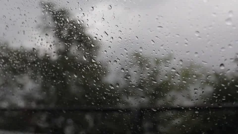 Image of rain from inside a car, window with drops Stock Footage 109549776