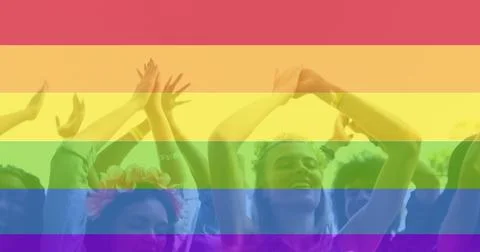 Image of rainbow over group of happy people Stock-Fotos