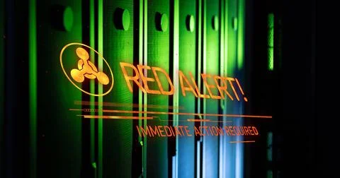Image of red alert text and symbol over server room Illustrazione stock