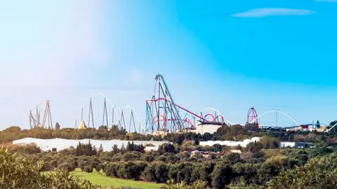 Image of red and blue roller coasters. Stock Photos