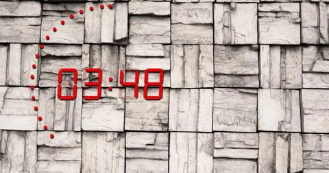 Image of red countdown over brick wall 스톡 사진