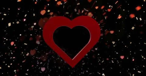 Image of red heart over light spots and confetti on black background Ilustração Stock