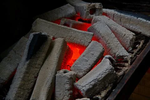 Image of red-hot coals of a fire close-up. Stock Photos