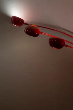 Image of a red interior lamp with the lights on Stock Photos