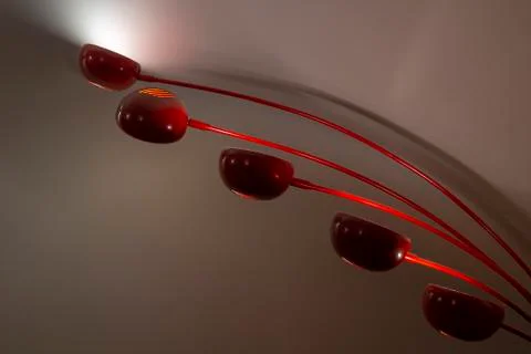 Image of a red interior lamp with the lights on Stock Photos