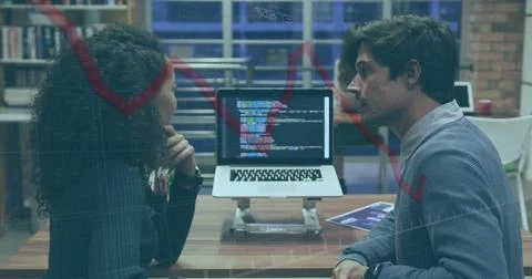 Image of red line and data processing over business people Foto stock