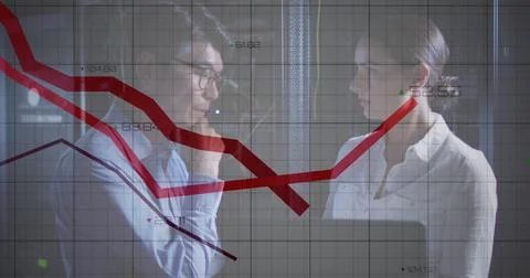 Image of red lines over diverse male and female it engineers with laptop by Stock-Fotos