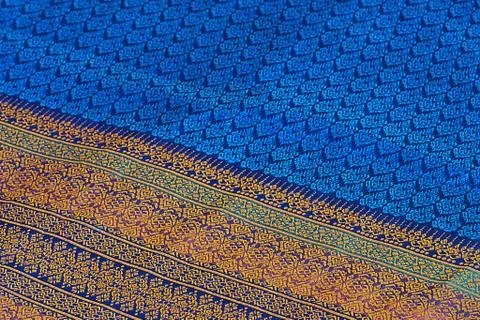 The image of the red Thai silk pattern that is woven in Thailand. Stock Photos