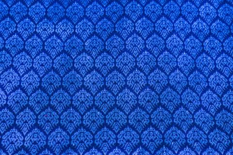 The image of the red Thai silk pattern that is woven in Thailand. Stock Photos