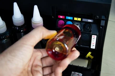 Image of refilling ink, printer, refillable printer Stock Photos