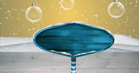 Image of road sign with copy space over snow falling and baubles on yellow Ilustração Stock
