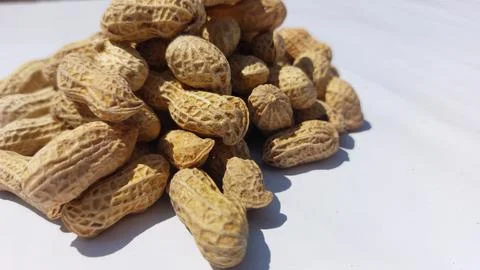 Image of roasted peanuts in shells with a dry and crunchy texture Stock Photos