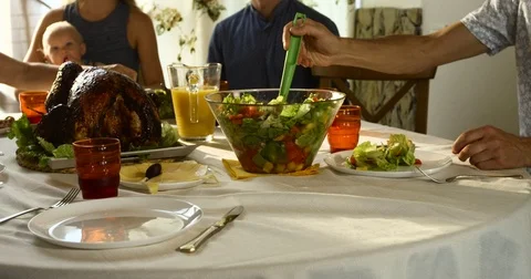 Image of roasted turkey on holiday table and family on background Stock Footage 73815369