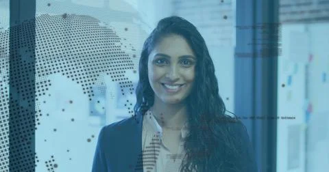 Image of rotating globe and computer language over laughing biracial woman Stock Photos