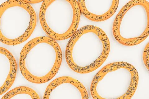 Image of round, speckled objects potentially donuts or cookies arranged appea Stock Photos