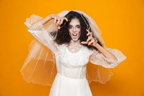 Image of scary dead bride on halloween wearing wedding dress and makeup terri Stock Photos